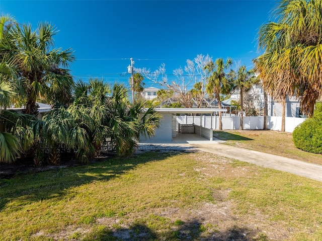 view of yard with a carport