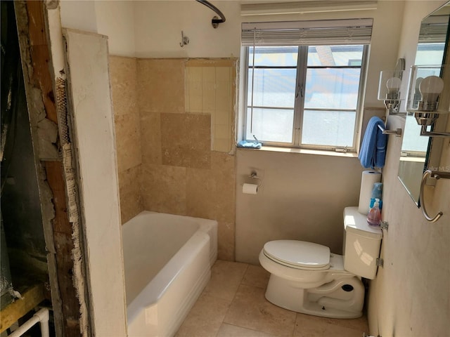 bathroom featuring toilet and tile patterned flooring