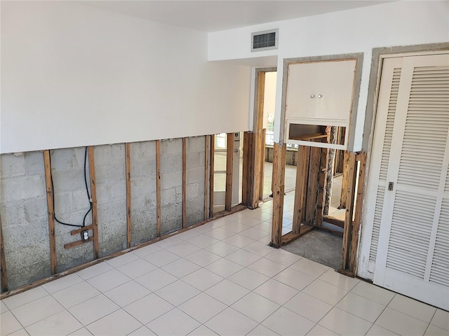 interior space with light tile patterned floors