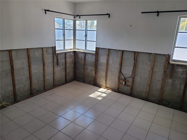 empty room with light tile patterned floors