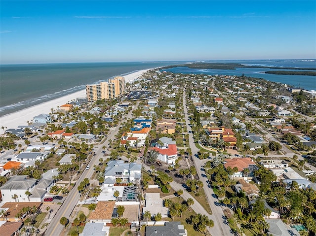 aerial view featuring a water view and a beach view