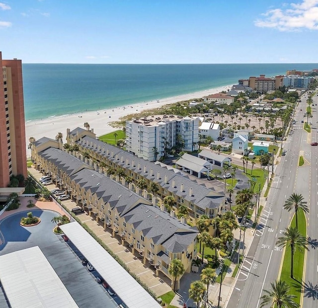 drone / aerial view with a view of the beach and a water view