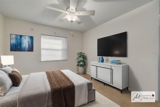 bedroom with light colored carpet and ceiling fan