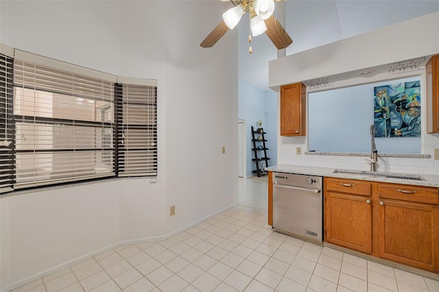 3985 Mermoor Dr, Palm Harbor, FL 34685 - kitchen featuring a ceiling fan, dishwasher, brown cabinetry, light tile patterned flooring, and a sink