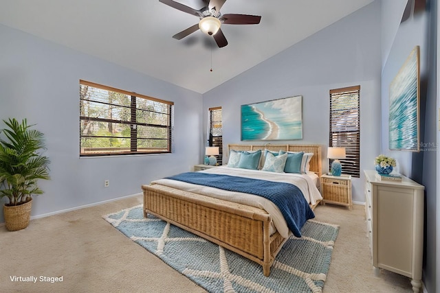 3985 Mermoor Dr, Palm Harbor, FL 34685 - bedroom featuring vaulted ceiling, light carpet, baseboards, and ceiling fan