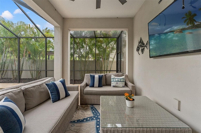 sunroom featuring a ceiling fan