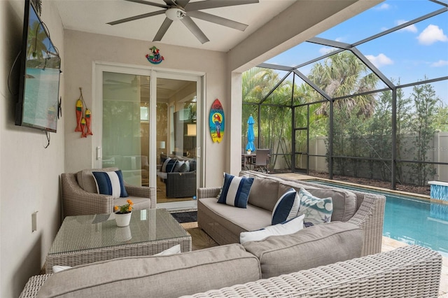 view of patio / terrace featuring glass enclosure, an outdoor pool, an outdoor living space, and a ceiling fan