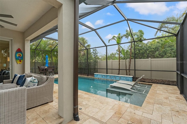 view of pool with a lanai, an outdoor hangout area, fence, a fenced in pool, and a patio area