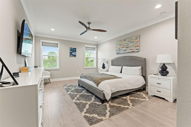 bedroom featuring light wood-style flooring, ornamental molding, baseboards, and recessed lighting