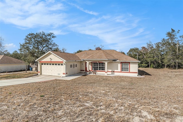 view of front facade with a garage and covered porch