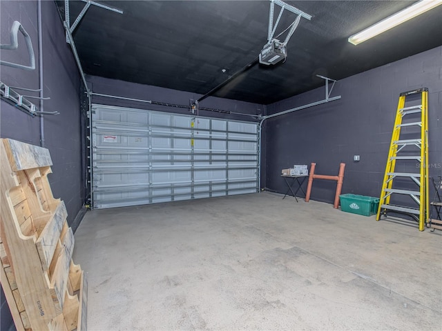 garage featuring a garage door opener