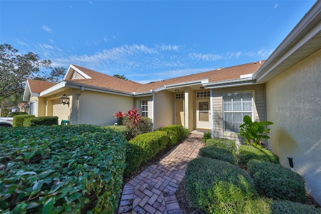 entrance to property with a garage