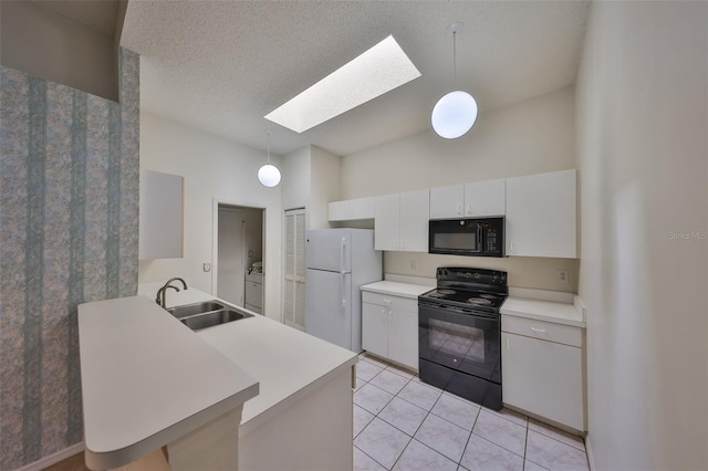 kitchen featuring pendant lighting, white cabinets, sink, and black appliances