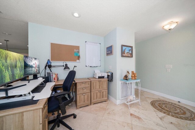 office area featuring a textured ceiling