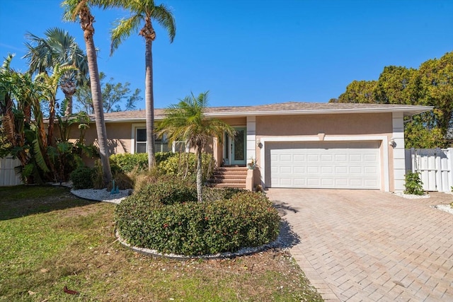 single story home with a garage