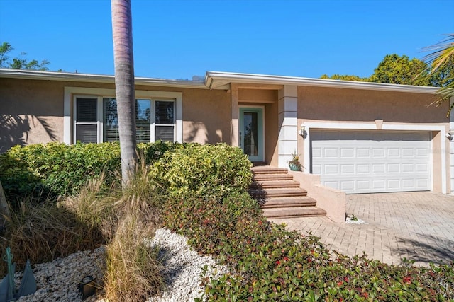 view of front of property featuring a garage