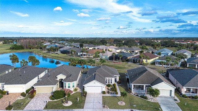 drone / aerial view featuring a water view