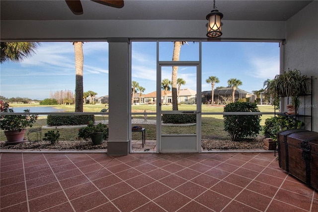 sunroom / solarium with ceiling fan