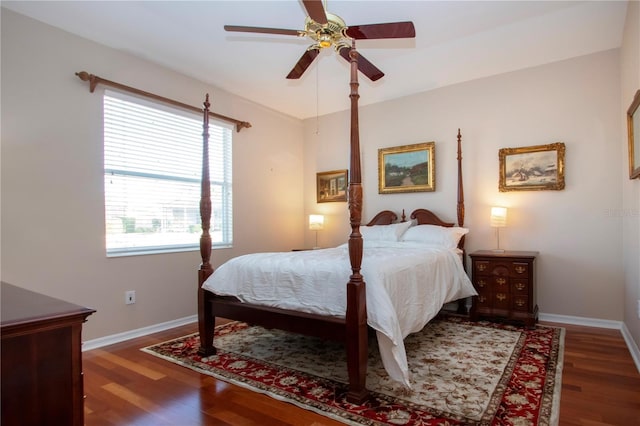 bedroom featuring dark hardwood / wood-style floors and ceiling fan