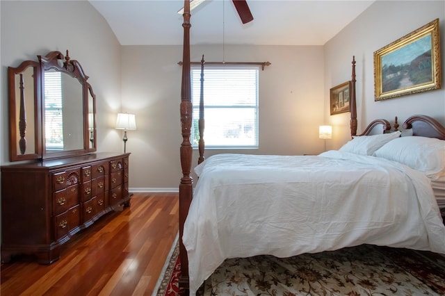 bedroom with dark wood-type flooring and ceiling fan