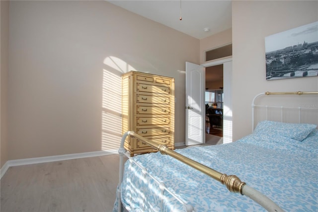 bedroom featuring hardwood / wood-style floors