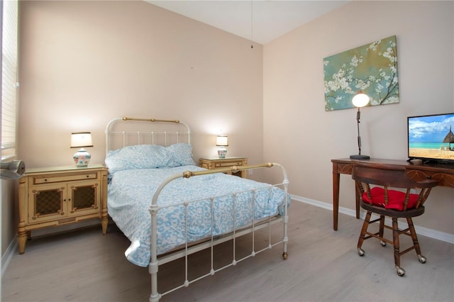 bedroom featuring hardwood / wood-style flooring