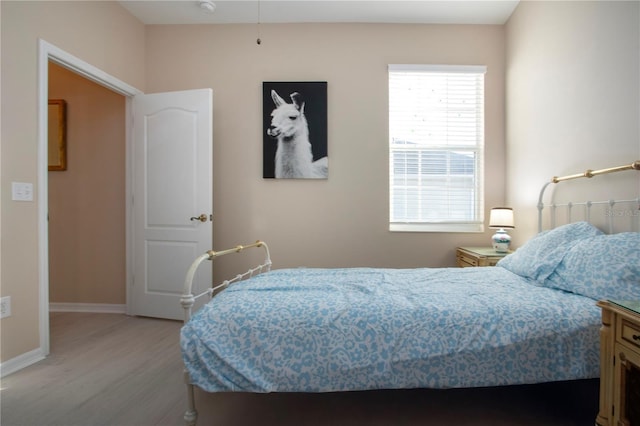 bedroom featuring light wood-type flooring