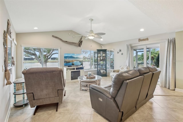 living room with vaulted ceiling, light tile patterned floors, and ceiling fan