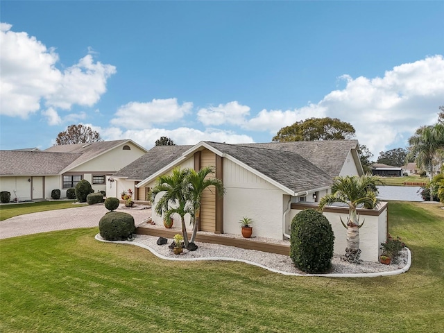 view of front of house with a front lawn