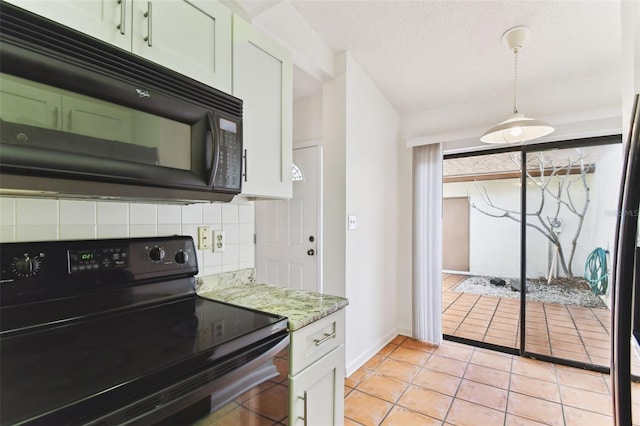 kitchen featuring light tile patterned flooring, white cabinetry, decorative backsplash, black appliances, and light stone countertops