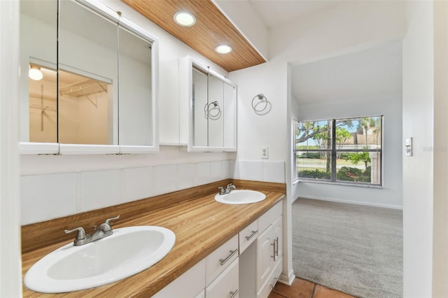 bathroom with vanity and tile patterned floors