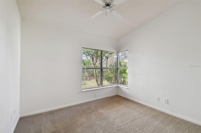 empty room featuring carpet flooring and ceiling fan