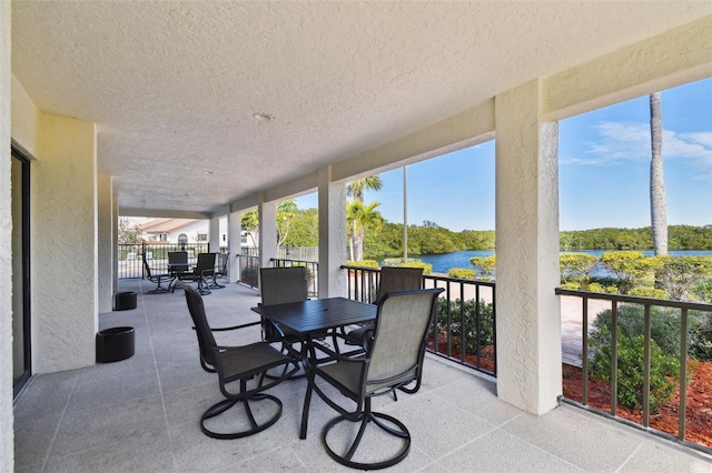 sunroom with a water view