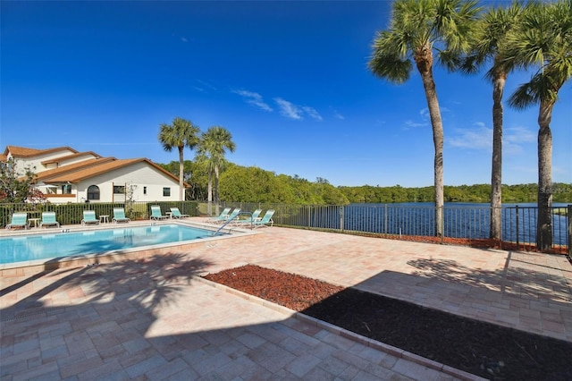 view of swimming pool with a patio area