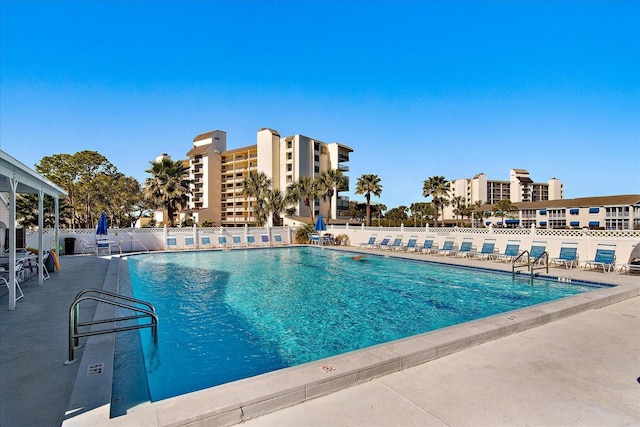 view of pool featuring a patio area