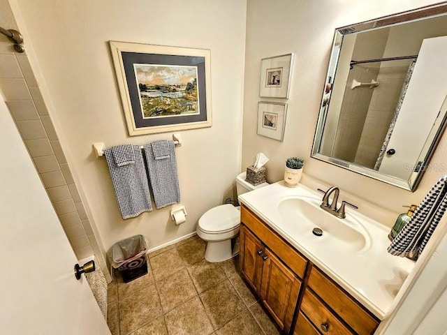 bathroom featuring vanity, toilet, tile patterned floors, and a shower with shower curtain