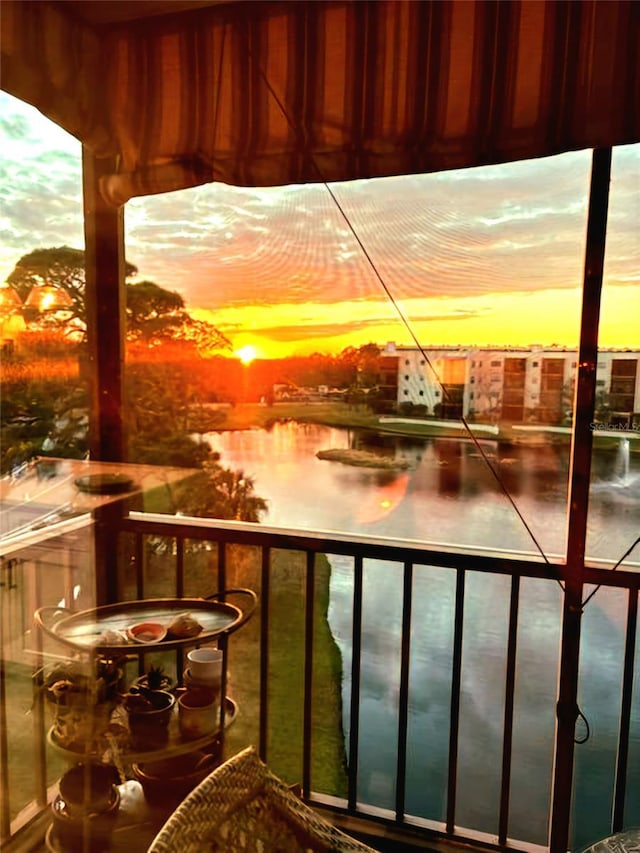 view of balcony at dusk