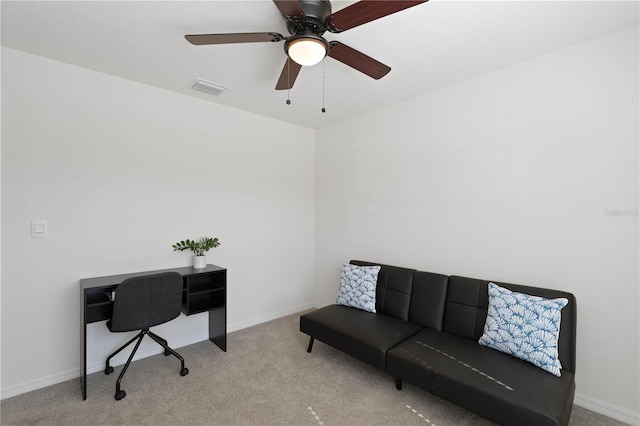 office with ceiling fan and light colored carpet