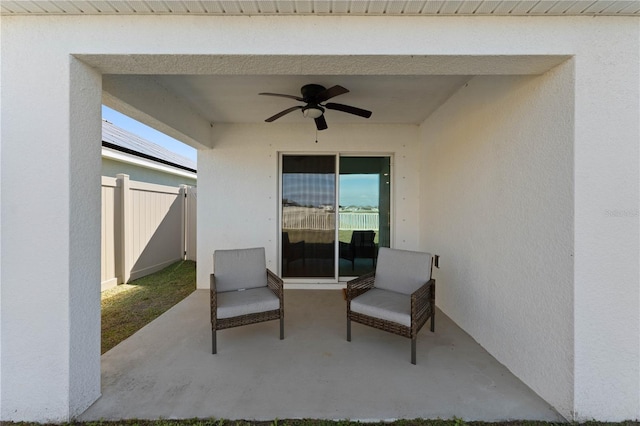 view of patio / terrace featuring ceiling fan