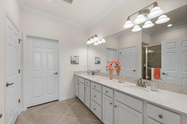 bathroom featuring ornamental molding, vanity, an enclosed shower, and tile patterned flooring