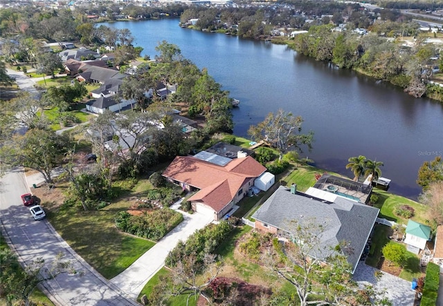 birds eye view of property featuring a residential view and a water view