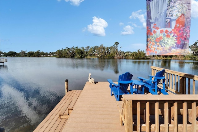 view of dock with a water view