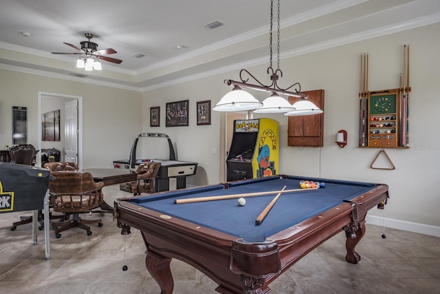 rec room featuring ornamental molding, pool table, ceiling fan, and a tray ceiling