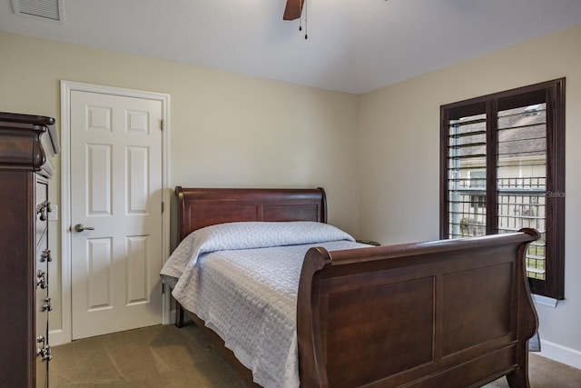 carpeted bedroom with ceiling fan