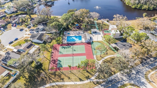 birds eye view of property featuring a water view