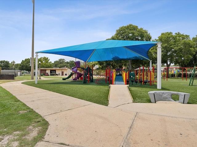 view of playground featuring a lawn