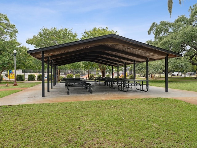 surrounding community featuring a lawn