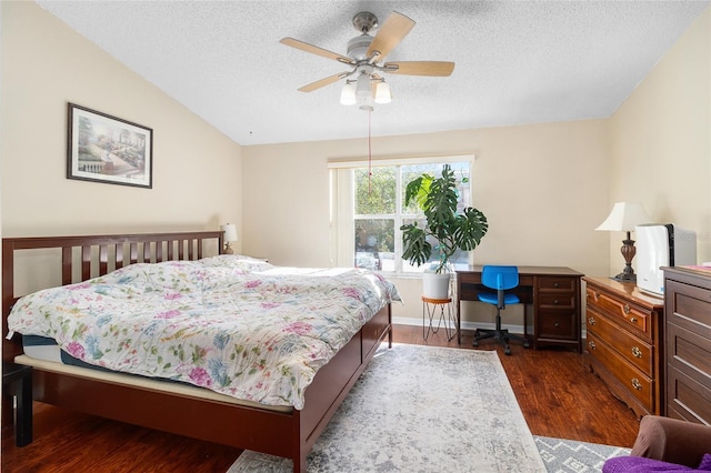 bedroom featuring vaulted ceiling, dark hardwood / wood-style floors, a textured ceiling, and ceiling fan