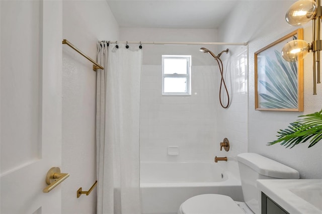 full bath with shower / bath combo, vanity, and toilet