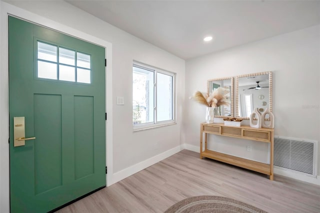 entrance foyer featuring recessed lighting, visible vents, baseboards, and wood finished floors